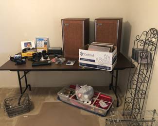 Speakers, vinyl records, gift wrap, CD rack, etc