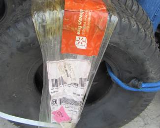 Two new tires for zero turn mower still packaged,
