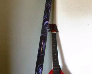Small First Act guitar, Wood wind instrument stands about 4 foot tall, I have pamphlet on it shown stuck in top blow tube.