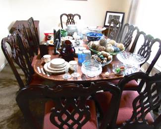 Table full of glassware. lots of lead crystal, collectible dishes and others.
