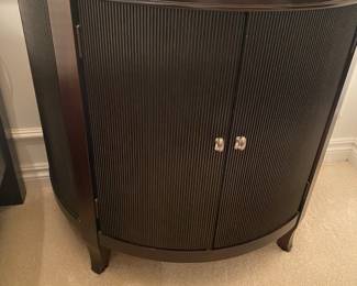 Lexington Home Brands- Nautical Home Modern Classics - A Demilune nightstand with a classic, modern design. Made from maple solids, cherry veneers, and dark cherry finish, it features brushed steel hardware and two deep shelves inside. Dimensions: 35 x 32 x 18.5 inches. $300.
