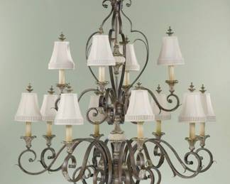 Murray Feiss English Palace 12 light chandelier featuring a British Bronze with gilded Imperial silver finish and beige accents. Linen shades complete this beautiful piece. $500