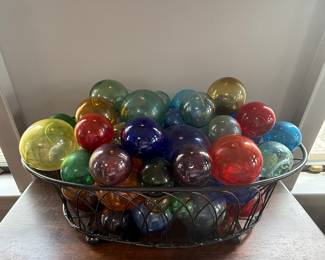 Basket of decorative hand blown glass fishing floats
$1650