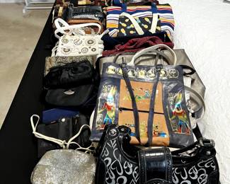 Two rooms have a variety of purses