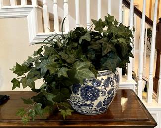 Faux plant in blue pot