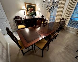 Dining table and chairs. Dining table expands to seat twelve.