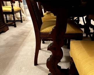 Dining table and chairs. Dining table expands to seat twelve.
