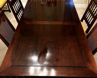 Dining table and chairs. Dining table expands to seat twelve.
