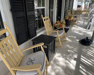 Outdoor rocking chairs, table and planters (swing is staying with the home).