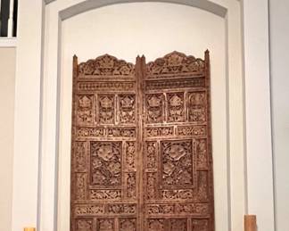 Wooden screen and candles