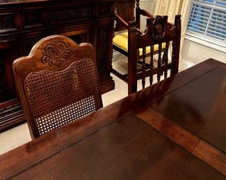 Dining table and chairs. Dining table expands to seat twelve.