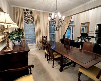 Dining table and chairs. Dining table expands to seat twelve.