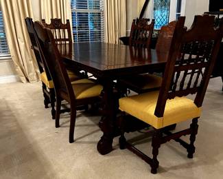 Dining table and chairs. Dining table expands to seat twelve.