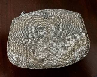 Two rooms have a variety of purses
