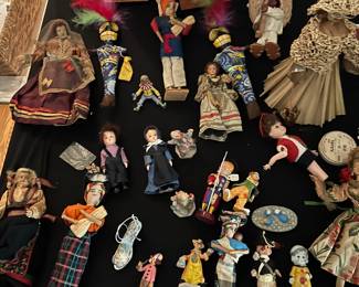 An assortment of collectible dolls