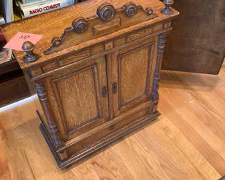 Arts and craft swan mini oak cabinet