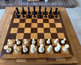 Beautiful handmade chess board (except chess pieces), perfect for roadtrips to keep pieces in place.