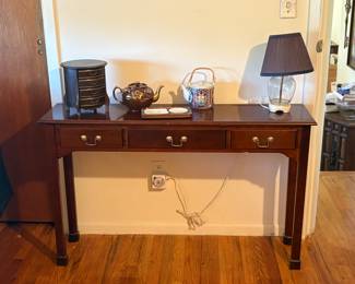 Console table, jewelry box and teapots