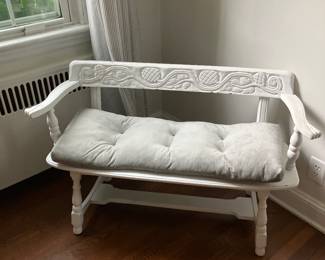 White bench with grey cushion