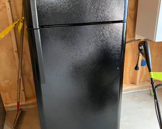 Black. Refrigerator great condition inside and out.