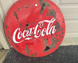 Coca Cola button sign