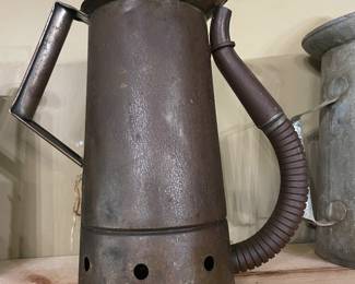 Antique oil can