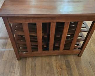 Turn this old magazine rack into a wine rack. Beautifully made.