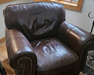 Matching leather chair to sofa. Make an offer and take them both.