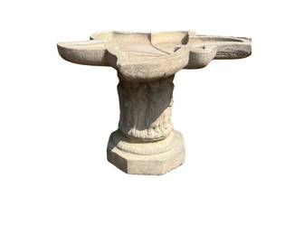 Concrete leaf shaped bird bath