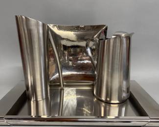 Sleek Italian, English stainless steel serving pieces