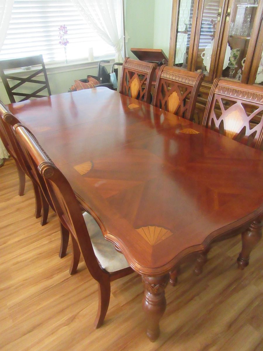 Beautiful inlaid table with 8 matching chairs,