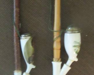 Two vintage German pipes one on right has been repaired at the neck of the bowl.