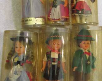 7 dolls with handmake clothing, Dolls stand about 5 to 7 inches tall,