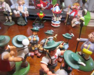 Miniature wooden figurines by German Erzgebire  Bavarian musicians. Very collectible and in great shape for their age.