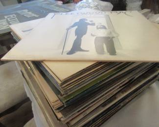 Stack of vintage albums, each priced separate.