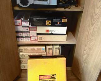 Kodak project in original box and has 8 slide reels and does have wired remote. Sold as a lot only.