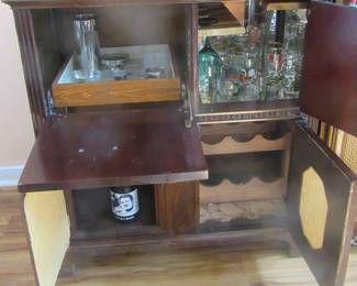 Inside of the converted radio cabinet does have wine rack.