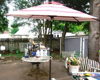 New 9 foot umbrella and cover.