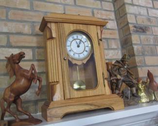 Small (battery) clock and horse items.