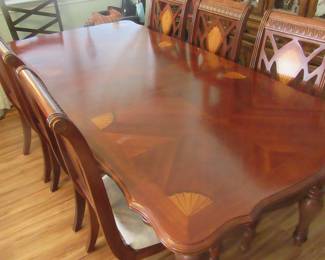 Beautiful inlaid table with 8 matching chairs,