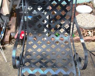 One four metal chairs, only two match.