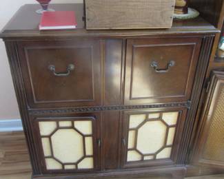 Vintage radio cabinet that has been converted to a liquor cabinet (see next picture).