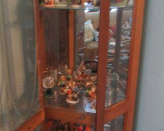 Display cabinet. Assortment of small items, sold separate.