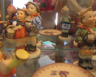Group of Hummels/Goebel's sold separate, located in living room.