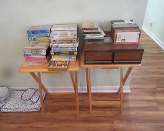 One stack of VHS tapes and DVDs and CDs I am guessing there are about 100 each. Located in the second bedroom. All the above will be priced at one dollar unless marked.