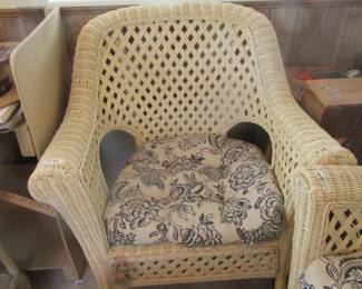 2 outdoor wicker type chairs.