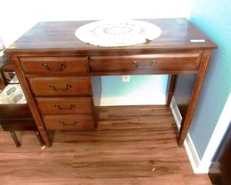 Very nice sewing machine cabinet (no machine inside) would make a great student desk.