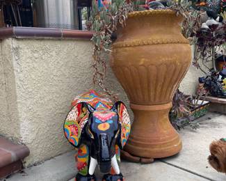 This elephant would brighten up any home or lawn!