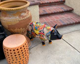 This pig would brighten up any home and can you just imagine him along side the elephant?