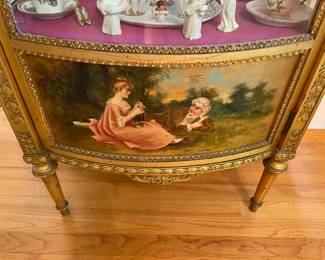 Antique Louis XVI style with marble top curio cabinet from the homeowner’s aunt in Baltimore